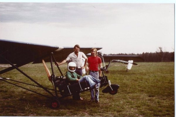 Arnold Cohen in his Avenger at St Marys, myself in red t shirt. A  Col Winton Cricket/ Jackeroo in background