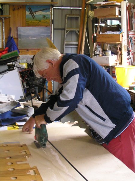 My project partner and long term flying friend Ray cutting out a new seat back