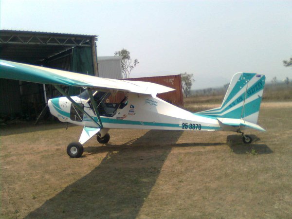 In front of hangar at Montpelier Airpark