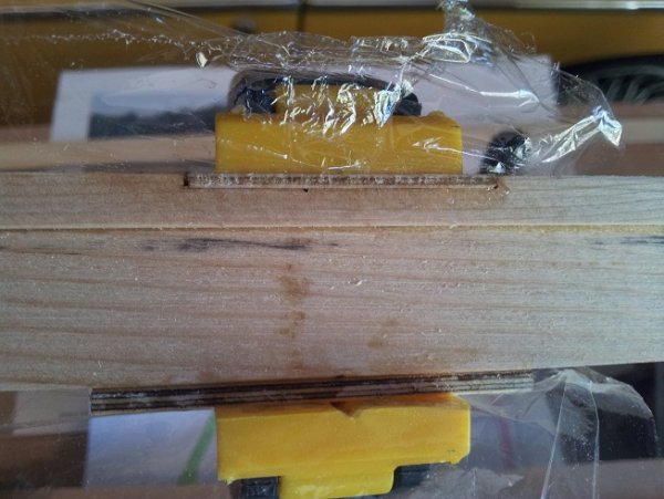 Reinforcement plate glued into beam