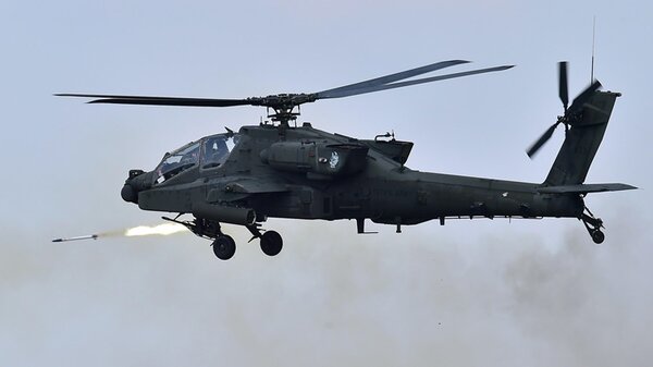 AH-64Apachefiringmissile.jpg_thumb.37ec09970c47bbc0e2c4fc2cb18e841e.jpg