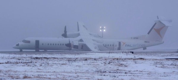 Dash8crashlabding.thumb.jpg.a28d73a943f23a1b9550fe34e0175514.jpg
